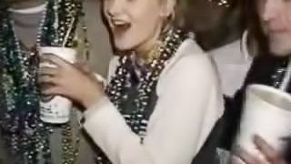 Blonde hottie flashes her nice tits during Mardi Gras