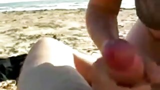 Dilettante oral stimulation on the beach