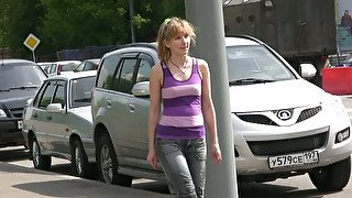 Skanky blonde Russian girl pees right in the middle of the street