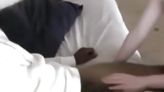 White girl sucks her black bf's cock, masturbates and has doggystyle sex on the sofa.