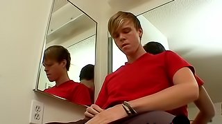 Horny blond twink Colby Bonds jerking his big cock for jizz
