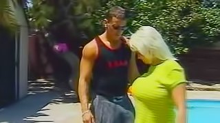 Busty and hot milf is satisfying her bf outdoors