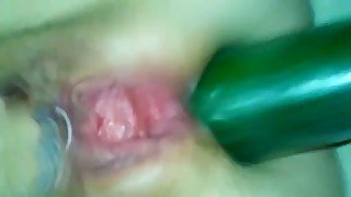 My wife gets a cucumber and my dick inside her as hole