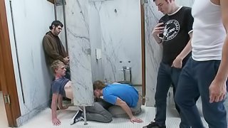 Handsome twink gets tortured and fucked in a public bathroom