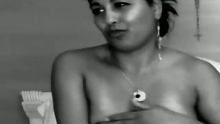 Busty and sassy Desi babe fingering herself on webcam