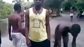 African sex in public. his buddies sing and cheer for him !!!