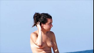 Topless beach beauty in Spain