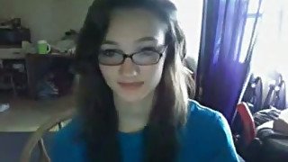 juggy nerdy brunette in glasses having fun on webcam