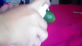 Long green cucumber up her ass