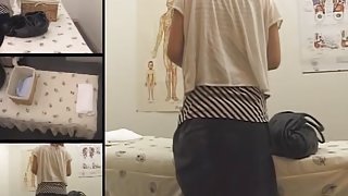 Japanese babe with nice tits enjoys a massage on spy cam