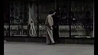 Vintage public BDSM movie of a hot brunette slave