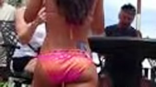 Girl with astonishing ass gets caught on a spy cam on a beach