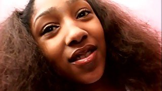 Toy addicted and messy haired black nympho gives a good blowjob to BBC