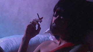 Sex-appeal stripper is smoking and sucking hard dick