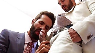 Two suited gay hunks sodomy scene