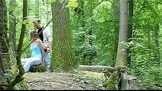 In the forest he ties her to a fallen tree and fucks her