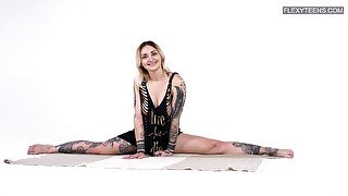 Tattooed gymnast Bassza Meg shows off her yummy pussy in all its glory