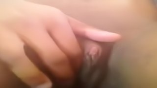 girl rubs her gigantic clit