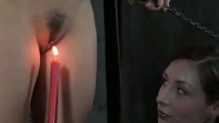 Brunette chick with sexy body is tortured with candle light