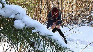 Russian redhead amateur beauty in the winter forest pisses