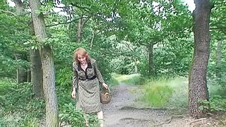 Fascinating matured granny giving big cock blowjob in the forest
