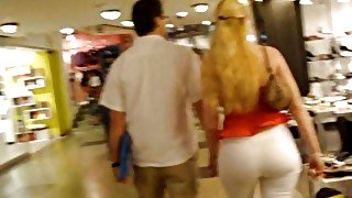 Spying on stunning blonde milf in the shopping center