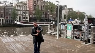 During his trip to Amsterdam he hires a hooker and bangs her