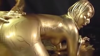 Ai Uehara is a sex slave covered in golden paint before a fuck