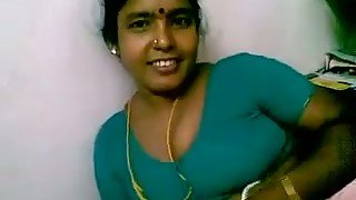 Sexy chubby dark skinned Indian housemaid flashes her big tits