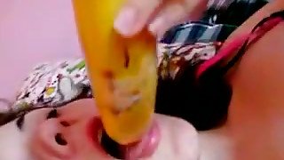 Raven head slutty sex pot pokes her thirsting kitty with long banana