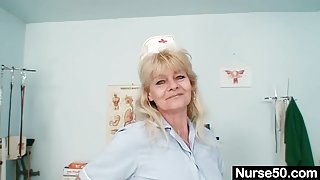 Aged blond lady shows off natural tits and dildo skills