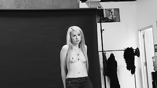 Blondemodel in black and white flashes her tits and pussy