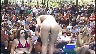 My naked horny wife is fully naked in the public show