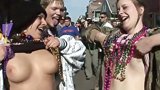 Fuck starving wanton sluts take part in fancy festival and show off their boobies in public
