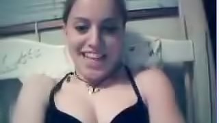 Blonde Girl Undressing In Front Of A Webcam After Loosing A Game