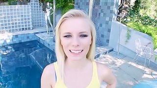 Cute blonde Elaina Raye licks and rubs a dick on the poolside