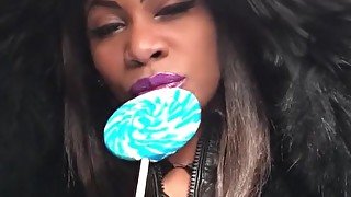 Brunette sugar babe licks lolly pop in the kinkies way