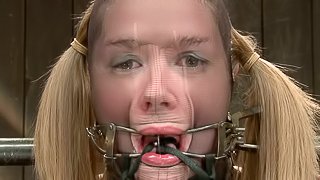 Rough BDSM action with pretty girl getting stuffed