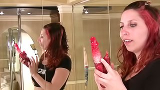 See this redhead give her pussy a good fucking with her vibrator