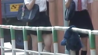 Asian teens have their panties down during street sharking.