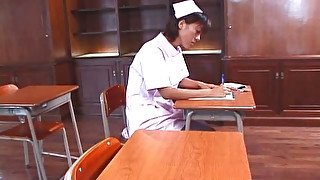 Lewd Japanese nurse Reimi Aoi shows off her beaver in cam