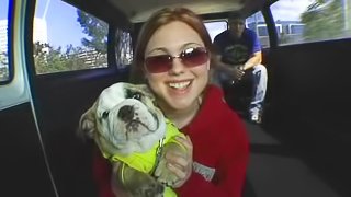 Cute redhead slut Ashley gives a nasty car blowjob