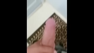 Jerking cock in bathroom