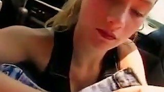 Cute blond haired teen gives my lucky buddy a really nice BJ in car