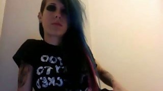 Skinny emo chick shows her tattooed booty for the webcam