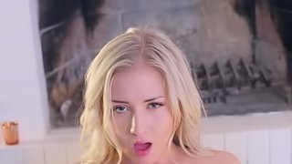 A blonde with hair on her pussy is fucking her man on the floor