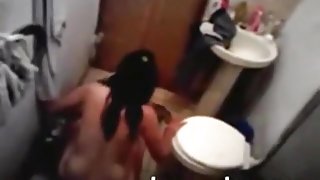 Voyeur tapes a latina having sex with her bf in the bathroom