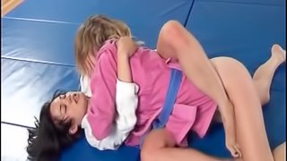 Two naughty wrestler chicks end up licking their twats