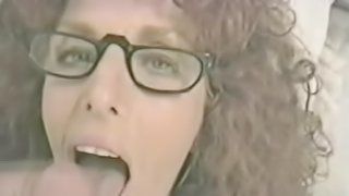 Curly Haired Brunette Wearing Glasses Does an Outstanding Blowjob