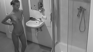 Leggy teen showers on hidden cam